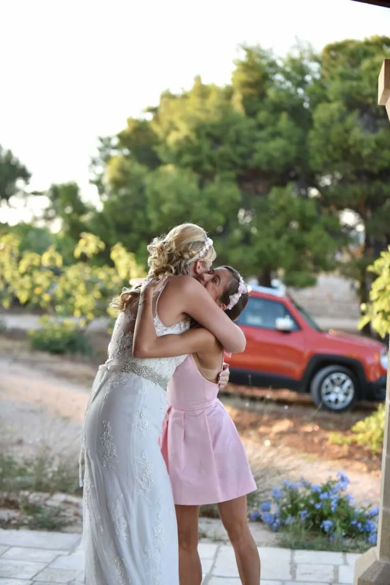 Hug before the wedding ceremony in Polignano a Mare