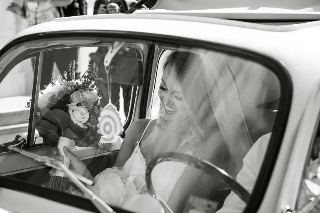 Bride in a vintage Fiat 500 in Sorrento