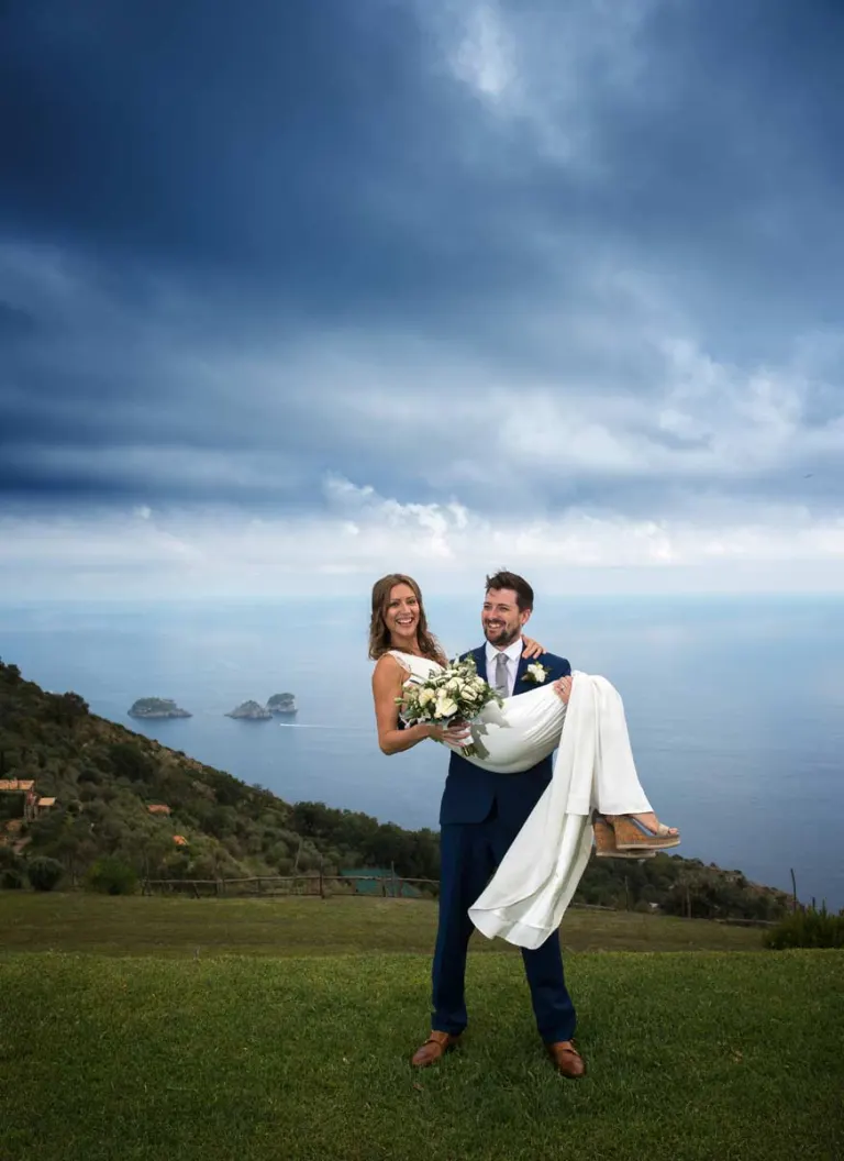Wedding couple with the Li Galli islands in the background