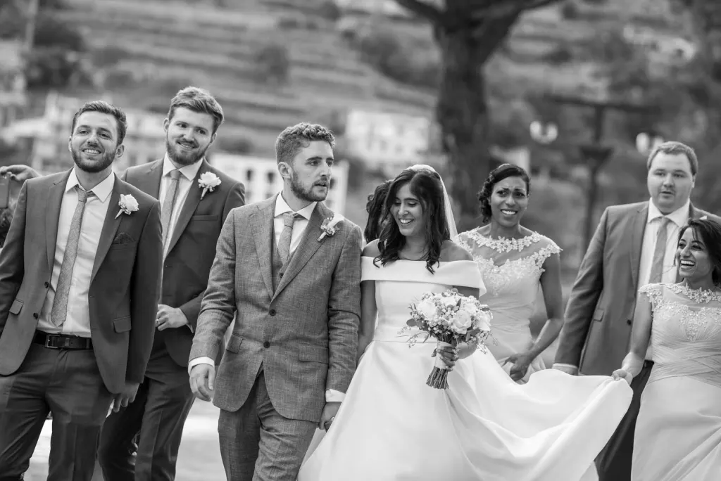 Bride and groom walking through Ravello