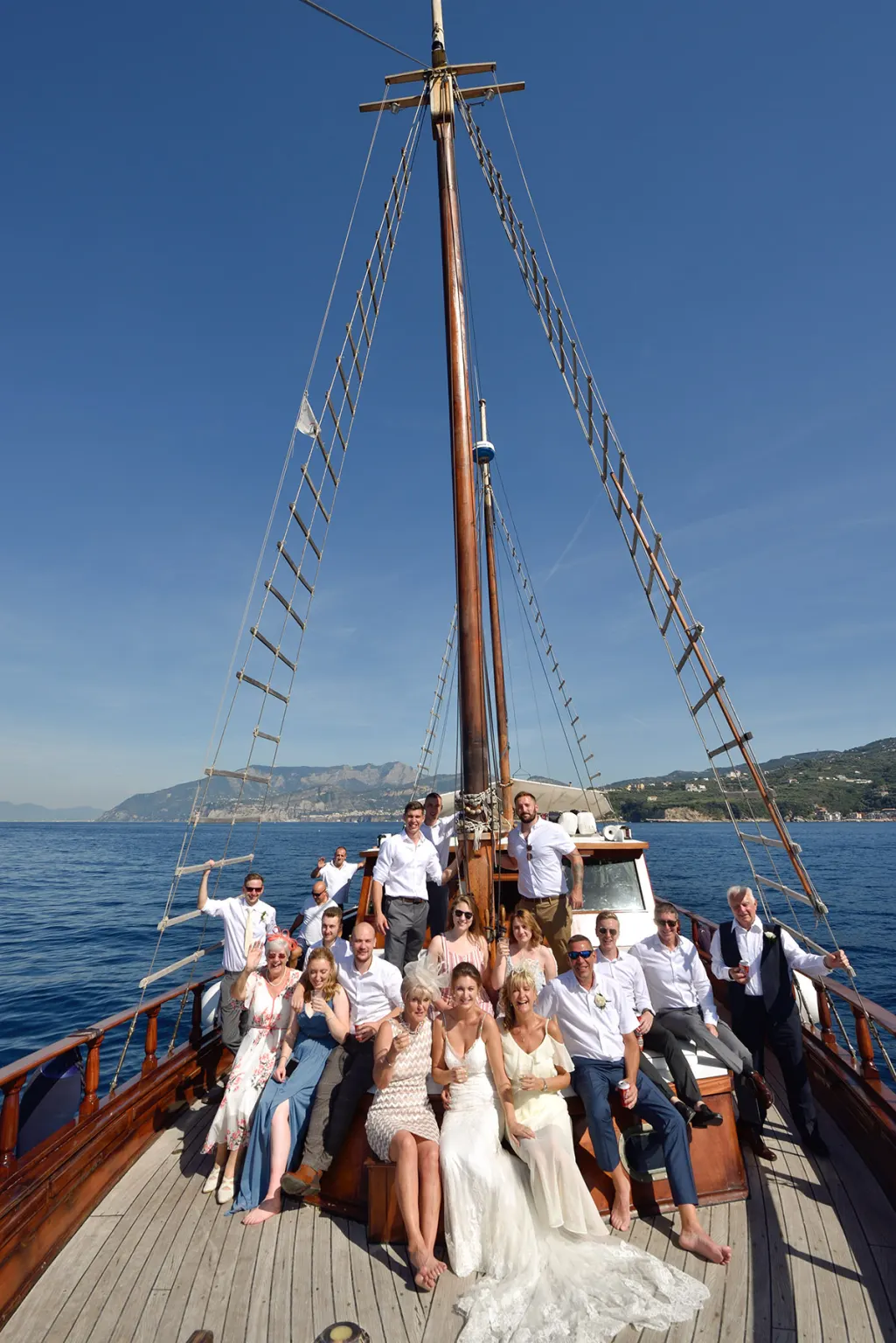 Newlyweds on a boat off the Amalfi Coast